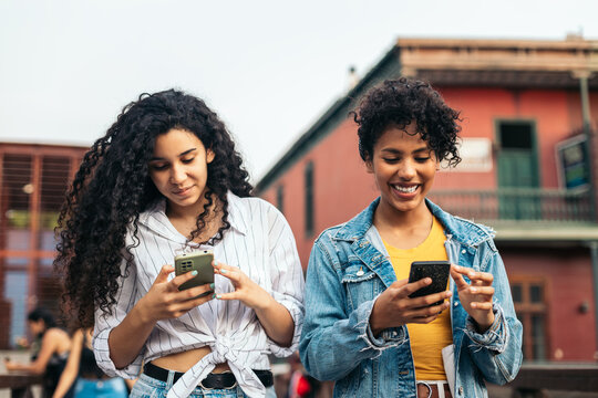 Young women walking in the street