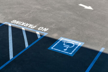 Blue lines and disabled sign place on parking
