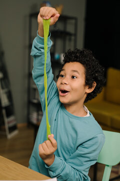 Boy playing with slime