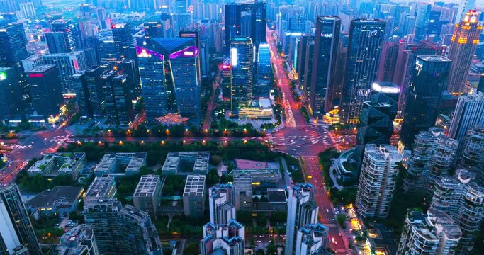 Aerial hyper lapse of Chengdu Cityscape at twilight  with buildings and traffic on the road