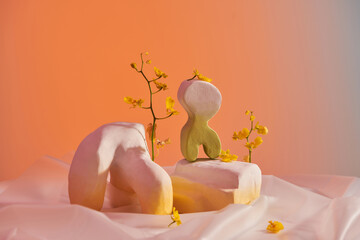  handmade ceramic vases on white textured table cloth. 