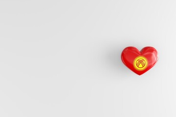The flag of the Kyrgyz Republic on a heart-shaped badge as a symbol of love for the motherland. Glossy badge with the state symbols of Kyrgyzstan. 3D rendering, copy space