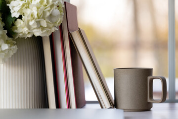 Coffee and books by the window