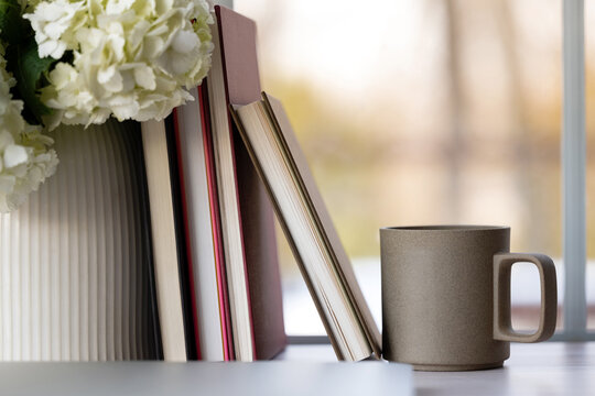 Coffee and books by the window