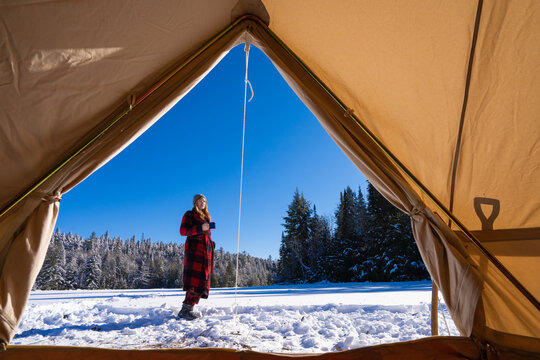 Relaxing with Coffee in Front of Winter Tent