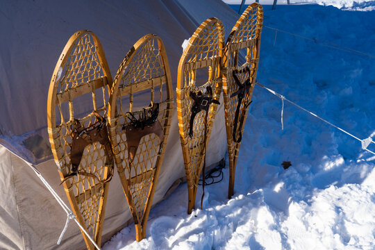 Tranditional Snowshoes with Canvas Tent in Winter