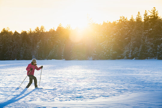 Nordic Skiing Across Remote Wilderness Frozen Lake