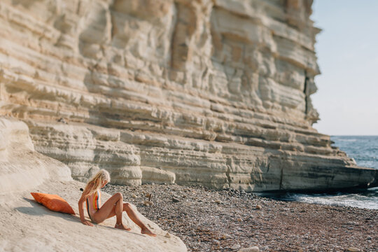 Teen girl on abandoned beach