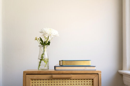 Book on dresser by table