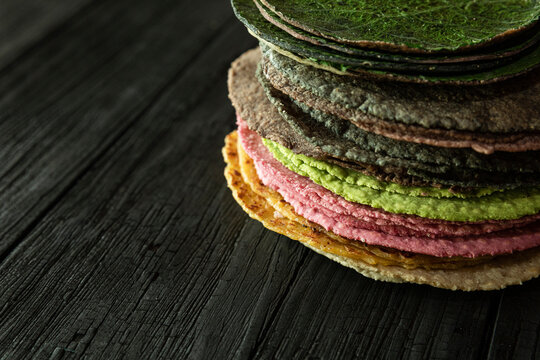 stacked tortillas of different colors 