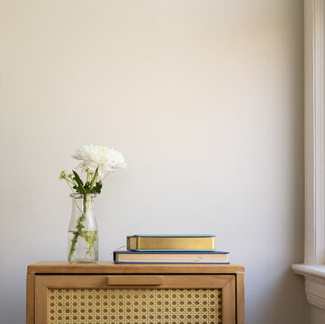 Book on dresser by table