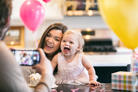 First Birthday Baby Sticks Out Tongue