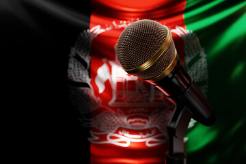 Microphone on the background of the National Flag of Afghanistan, realistic 3d illustration. music...