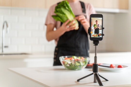 Close Up Of Live Streaming Cooking Using Phone 