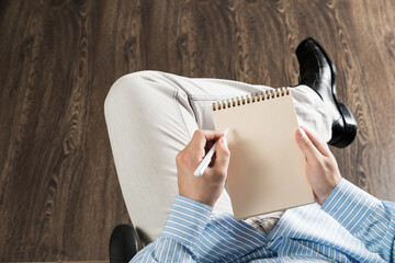 businessman with notepad, works in the office