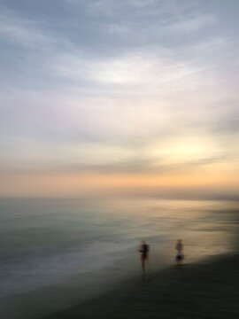 At dawn long exposure blurry image on the beach