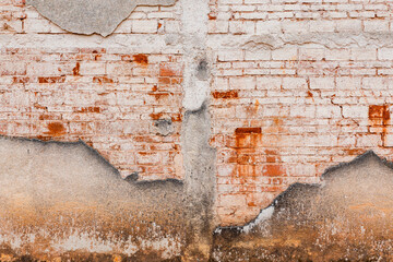 Dirty wall with old red bricks 