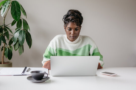 Portrait of a confident business woman working at a desk