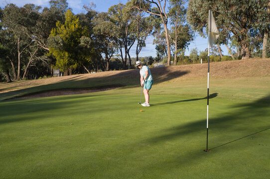 Golfer on putting freen
