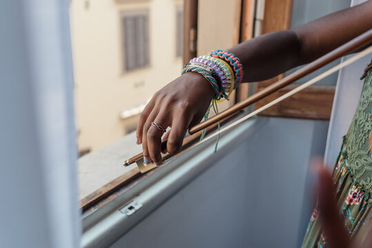 Black girl's hand on a bow