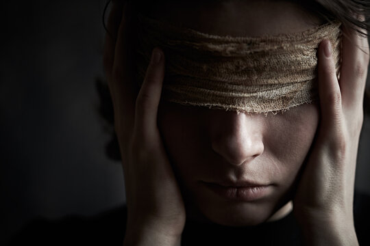silent blindfolded girl