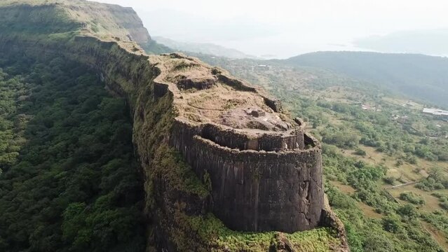 Tourists walking on ancient Vinchu Kada wall show scale of huge fort