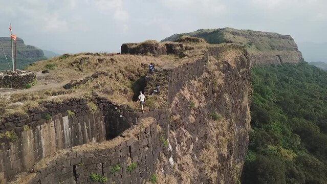Adventurous tourists explore ancient Vinchu Kada fort hill station