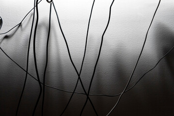 Computer wires under a desk.