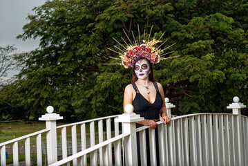 Young woman with sugar skull makeup. Catrina portrait.