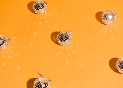 Disco Balls on orange Background