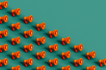 Orange megaphones on green. 3d render