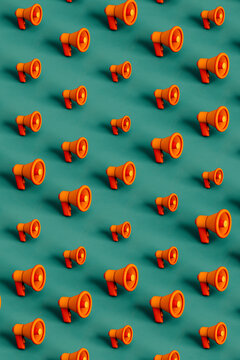 pattern of Orange megaphones in different position on green. 3d render