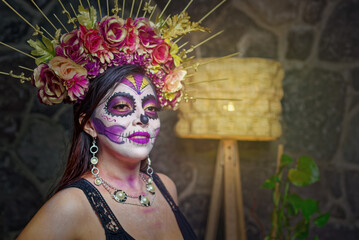 Young woman with sugar skull makeup. Catrina portrait.
