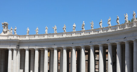 Columns of the Colonnade of the Bernini in St Peter square - obrazy, fototapety, plakaty