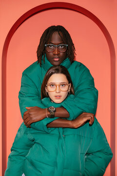 Stylish diverse teenage models in similar outfits