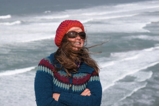 windswept hair at the oceanside