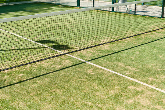 Padel court net outside in summer