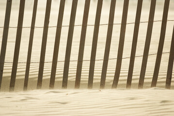 Wooden fence on a sandy beach, Santa Monica, California, USA