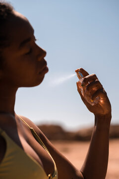 Spraying perfume