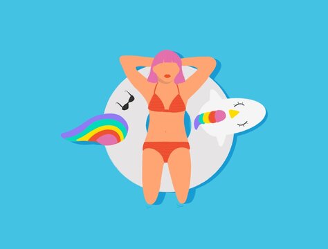 Woman on unicorn float in the pool