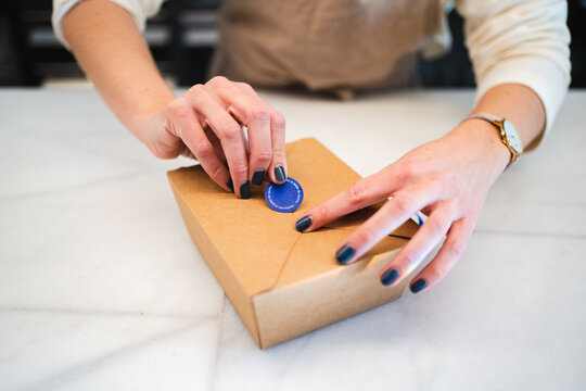 Waitress preparing takeaway order