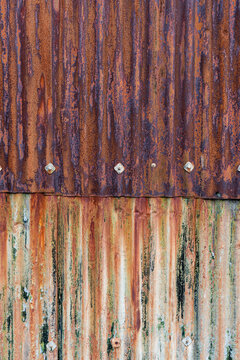 Two rusty metal sheets
