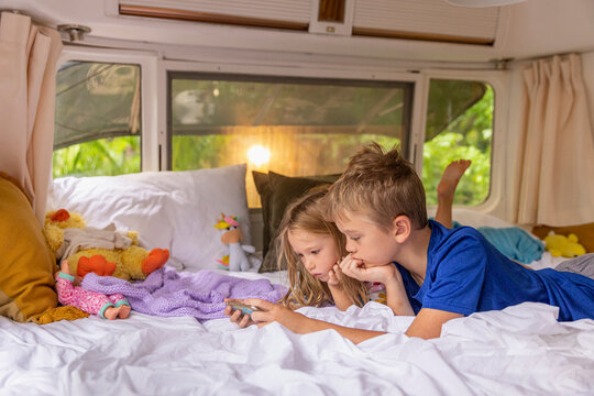 Family Portrait of onboard lifestyle in RV on Vacation 