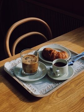 A breakfast bowl on top of a wooden table.