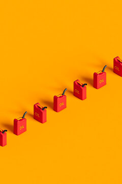 a row of red oil tank on orange background