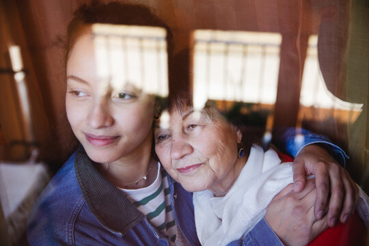 Grandmother and granddaughter embraced