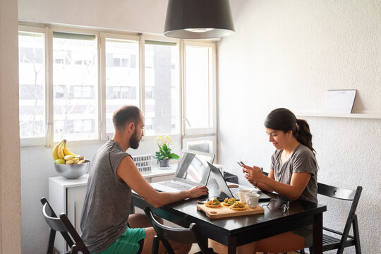 Couple Working From Their Home