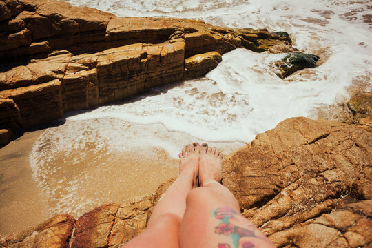 My legs resting in the Chilean sea