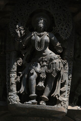 Stone Sculpture of Beautiful Female (Madanikas) with selective focus, 12th century Hindu temple,...