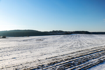 dangerous road in winter after snowfall,